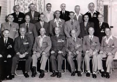 Black & White Photograph of Norman W. BAKER (group of 20 Officers)