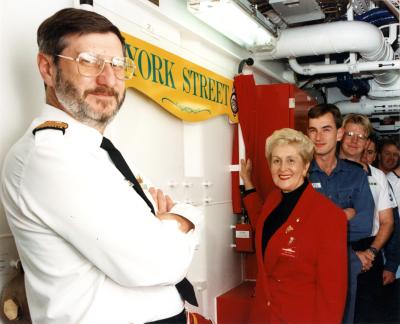 Colour photograph of Mayor Annette Knight unveiling a York Street sign aboard HMAS ANZAC with Captain Les Pataky.