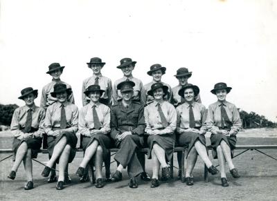 Black & White Photograph of 11 Australian Women’s Army Service Personnel and Major Vaughan at Princess Royal Fortress