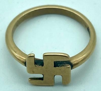 WWI era gold ring featuring good luck symbol