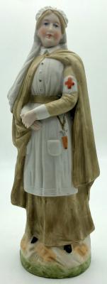 Bisque figurine of a Boer War military nurse