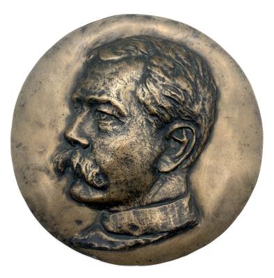 Circular bronze bas relief plaque of Lord Kitchener 