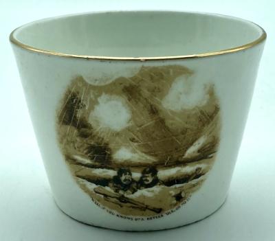 WWI era china cup featuring Bruce Bairnsfather cartoon