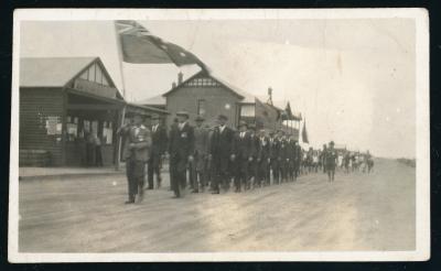 Black & White Photograph of Aubrey John Akrill BECKLEY marching in the ‘ANZAC Day’ Parade in Mukinbudin WA