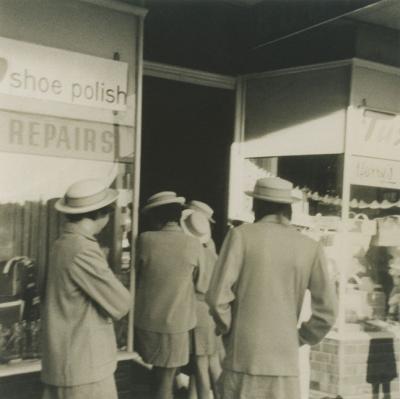 Girls Outside Bootmakers Shop