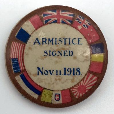WWI souvenir button celebrating the signing of the Armistice
