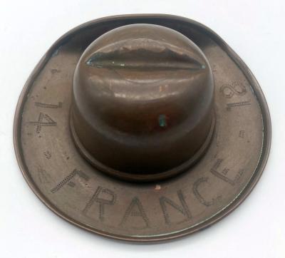 WWI trench art copper slouch hat with rising sun badge