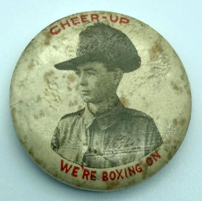 WWI fundraising button 'Cheer-Up, We're Boxing On'