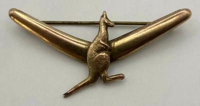 9ct gold, silver lined brooch featuring a kangaroo on a boomerang