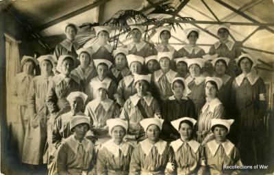 WWI photographic postcard of a group of Y.M.C.A workers