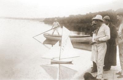 Model Boat Sailing On Freshwater Bay