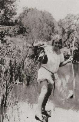 Young Woman At River's Edge