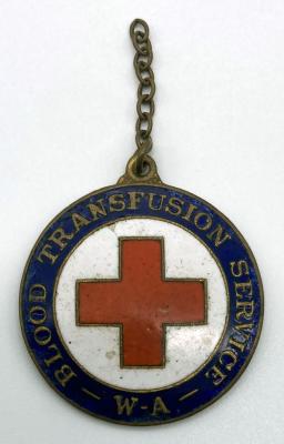 Metal and enamel fob presented to Red Cross Voluntary Donor, M.Reid