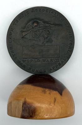The Lawn Tennis Association of Victoria War Funds Appeal trophy on mulga base