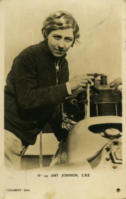 Postcard featuring close up of Amy Johnson next to plane