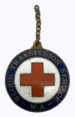 Metal and enamel fob presented to Red Cross Voluntary Donor, M.Reid