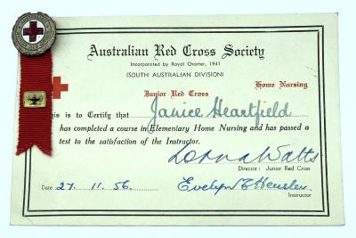 Australian Junior Red Cross certificate and badge awarded to Janice Heartfield