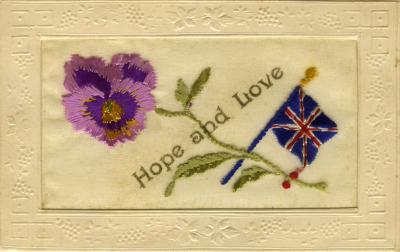 WWI silk postcard with flower, flag and 'Hope and Love'