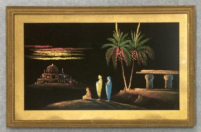 Framed painting on black velvet of Middle Eastern scene
