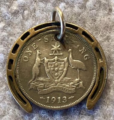 WWI era good luck pendant in form of horseshoe