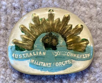 Perspex sweetheart brooch depicting rising sun badge - blue and gold