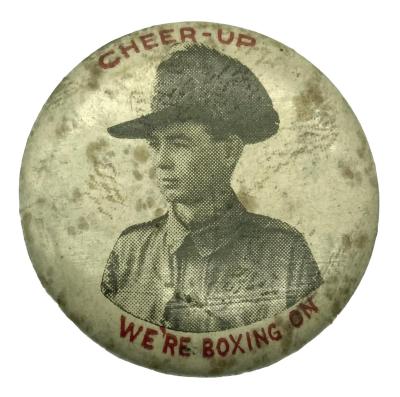 WWI fundraising button 'Cheer-Up, We're Boxing On'