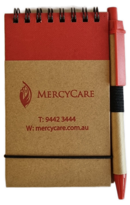 26-251.4 Notepad and Pen with MercyCare Old Logo photo without background. 