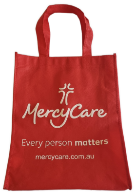26-259 Red MercyCare bag with the new MercyCare logo, photo without background.