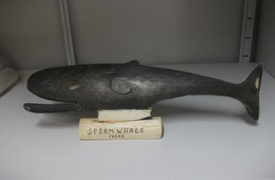 Carved sperm whale made from bone and ivory.