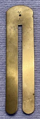 WWI era brass button stick made by M.S.F.