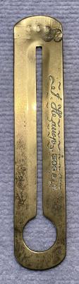 Antique brass button stick engraved with name - J. Harrop