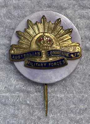 Miniature Rising Sun badge stick pin on lilac backing