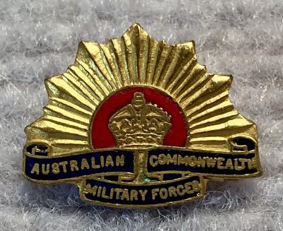 Miniature Rising Sun badge metal and enamel brooch
