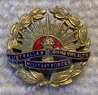 Brass and enamel Rising Sun badge sweetheart brooch