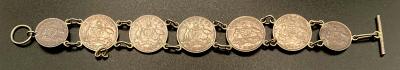 Trench art coin bracelet made from sixpences and threepences
