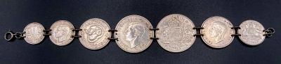 WWII era trench art coin bracelet given to Louise by Ernie 1944