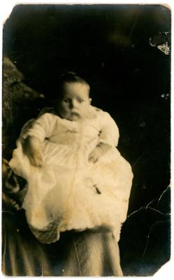 Black & White Photograph Postcard of a Baby in Christening Dress