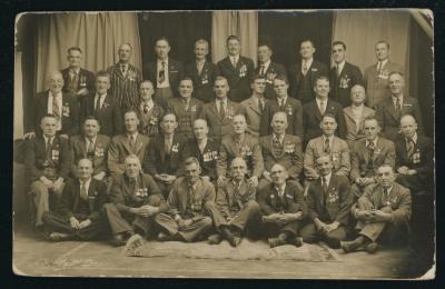 Black and White Photographic Postcard of First World War Veterans with Pte C. W. FEIDLER, 3326