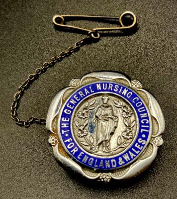 The General Nursing Council for England and Wales badge presented to E.E. Webb 1943 