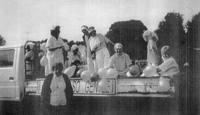 Gentle Gym float 2001. Front: Betty Cockman. L-R on truck: Ann Stewart, Minnie Green, Fred Green, Elizabeth Jones, Trish Cato, Sue Moss.