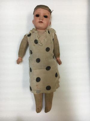 Cloth and plastic doll