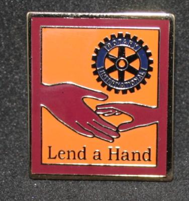 BADGE - ROTARY PRESIDENTIAL THEME LEND A HAND 2003-04