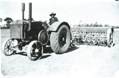 Black and White photograph Daadenning Creek John Deere Tractor and combine - Cole Property