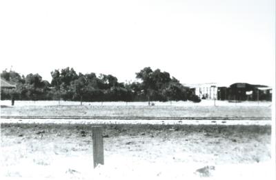 Black and White photograph Electweld Steel Co from Railway Line