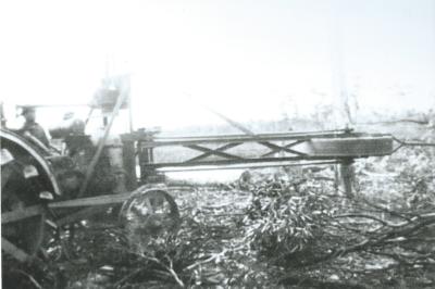 Black and White photograph Electweld patented circular saw on Fordson Tractor with gas producer