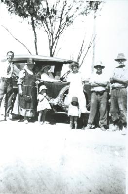 Black and White photograph.  Gunn family and others at Mt Caroline Hudson Car