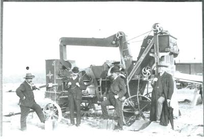 Black and White photograph.  Mathers chaff cutting plant.  J J Mather - black dot