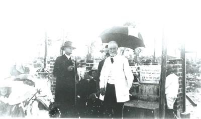 Black and White photograph.  R B Leake esq lays foundation stone of Methodist Church Reverend Harley Morrell on left