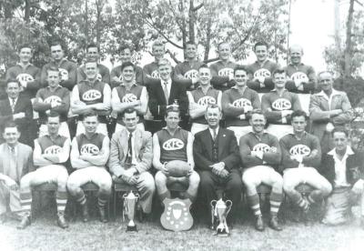 Black and White photograph : Kellerberrin Football Club 'A' grade premiers 1955 Back Row: L-R J Howlett, D Cole, E Doncon, S Humpleby, R Gibbs, J Gibbs, K Carrott, H Ware, R Hathaway Centre Row: W Skippings (Vice Pres), C Hicks C May, R Johnson, K Smit...