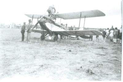 Black and White photograph.  East - West Air Race.  Aeroplane in Tammin